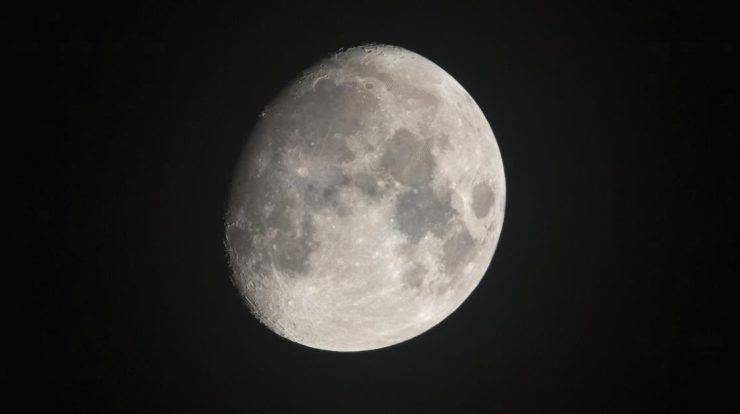 Gibbous waxing moon sky